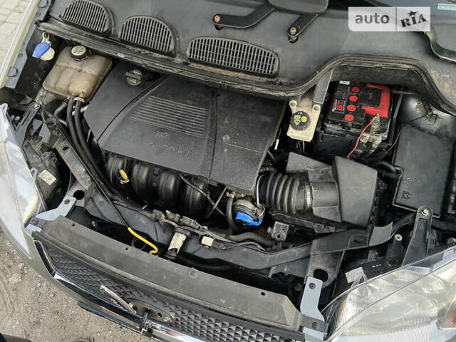 Серый Форд Focus C-Max, объемом двигателя 1.8 л и пробегом 248 тыс. км за 3775 $, фото 6 на Automoto.ua