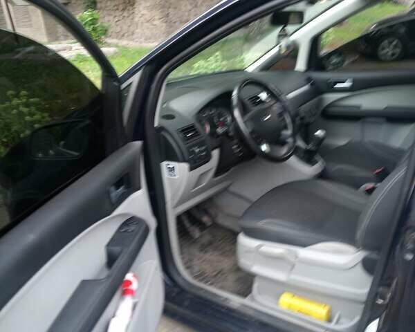 Синий Форд Focus C-Max, объемом двигателя 1.8 л и пробегом 230 тыс. км за 4100 $, фото 5 на Automoto.ua