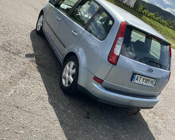 Синий Форд Focus C-Max, объемом двигателя 1.8 л и пробегом 318 тыс. км за 3899 $, фото 4 на Automoto.ua