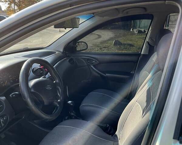 Білий Форд Фокус, об'ємом двигуна 1.4 л та пробігом 200 тис. км за 3500 $, фото 9 на Automoto.ua