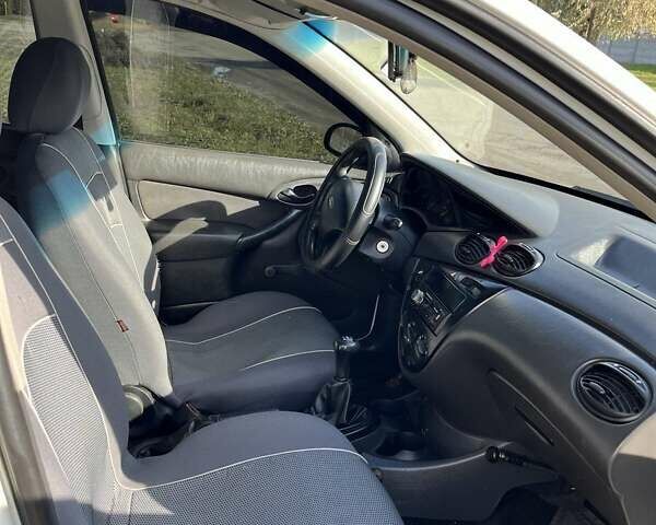 Білий Форд Фокус, об'ємом двигуна 1.4 л та пробігом 200 тис. км за 3500 $, фото 3 на Automoto.ua