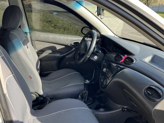 Белый Форд Фокус, объемом двигателя 1.4 л и пробегом 200 тыс. км за 3500 $, фото 9 на Automoto.ua