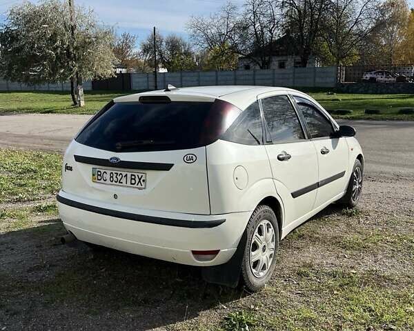 Білий Форд Фокус, об'ємом двигуна 1.4 л та пробігом 200 тис. км за 3500 $, фото 26 на Automoto.ua