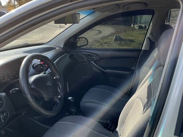 Белый Форд Фокус, объемом двигателя 1.4 л и пробегом 200 тыс. км за 3500 $, фото 11 на Automoto.ua