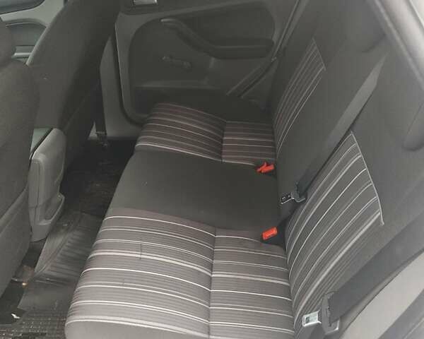 Белый Форд Фокус, объемом двигателя 1.8 л и пробегом 291 тыс. км за 3750 $, фото 10 на Automoto.ua