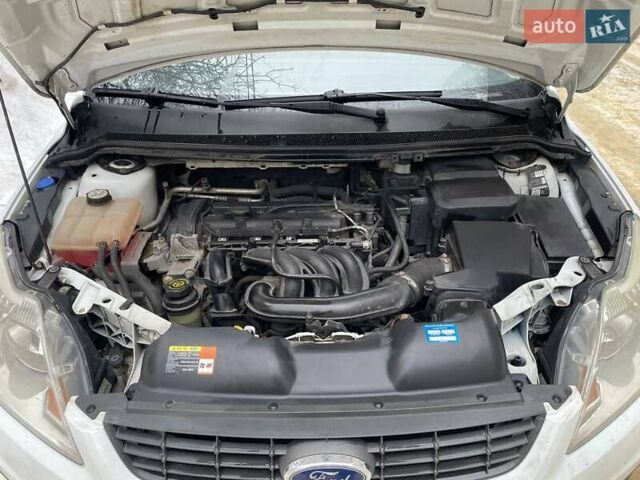 Белый Форд Фокус, объемом двигателя 1.6 л и пробегом 210 тыс. км за 5600 $, фото 8 на Automoto.ua