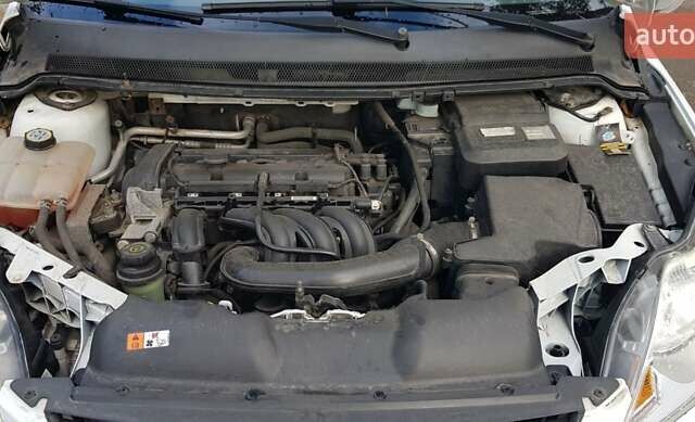 Белый Форд Фокус, объемом двигателя 1.4 л и пробегом 112 тыс. км за 5500 $, фото 11 на Automoto.ua