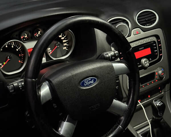 Білий Форд Фокус, об'ємом двигуна 2 л та пробігом 260 тис. км за 6400 $, фото 9 на Automoto.ua