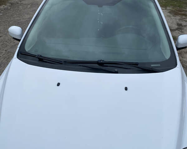 Белый Форд Фокус, объемом двигателя 1.4 л и пробегом 247 тыс. км за 6500 $, фото 8 на Automoto.ua