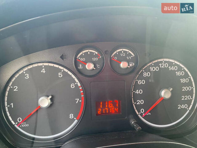 Белый Форд Фокус, объемом двигателя 1.4 л и пробегом 234 тыс. км за 6300 $, фото 3 на Automoto.ua