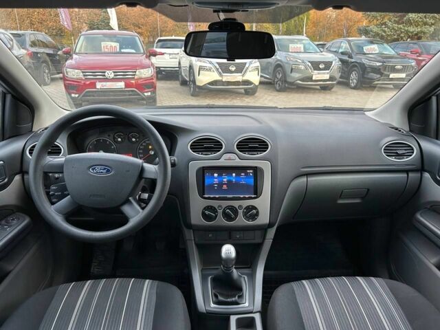 Белый Форд Фокус, объемом двигателя 1.4 л и пробегом 167 тыс. км за 5900 $, фото 9 на Automoto.ua