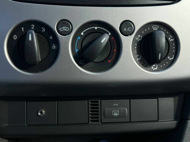 Білий Форд Фокус, об'ємом двигуна 1.4 л та пробігом 204 тис. км за 5100 $, фото 12 на Automoto.ua