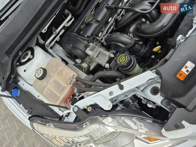 Білий Форд Фокус, об'ємом двигуна 1.4 л та пробігом 91 тис. км за 6800 $, фото 31 на Automoto.ua