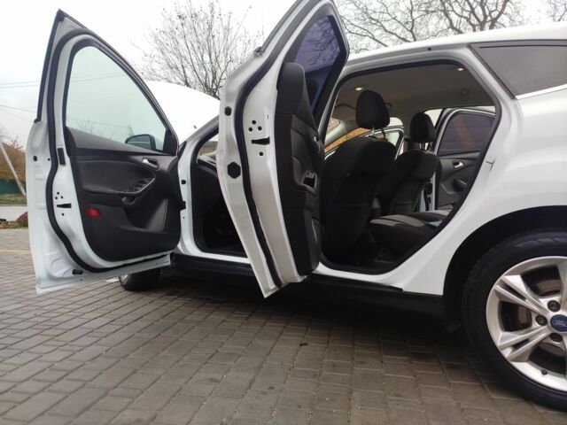 Белый Форд Фокус, объемом двигателя 1.6 л и пробегом 266 тыс. км за 6999 $, фото 16 на Automoto.ua