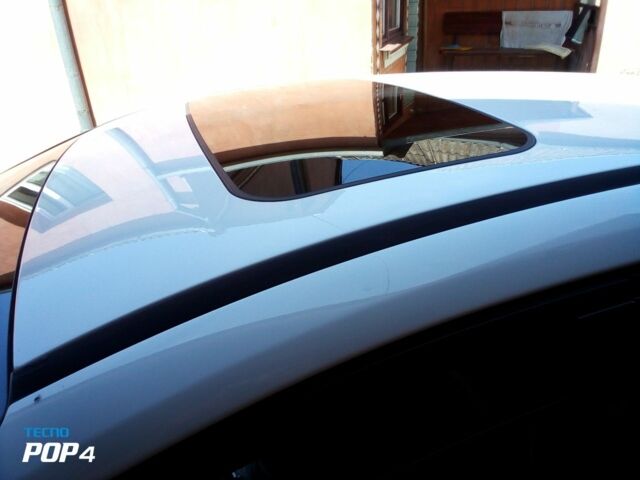 Білий Форд Фокус, об'ємом двигуна 1.6 л та пробігом 212 тис. км за 7000 $, фото 4 на Automoto.ua