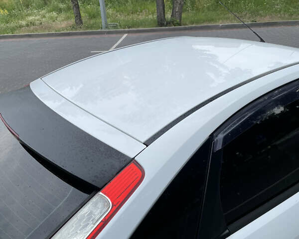 Білий Форд Фокус, об'ємом двигуна 1.4 л та пробігом 325 тис. км за 5000 $, фото 31 на Automoto.ua