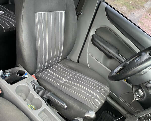 Белый Форд Фокус, объемом двигателя 1.4 л и пробегом 247 тыс. км за 6500 $, фото 15 на Automoto.ua