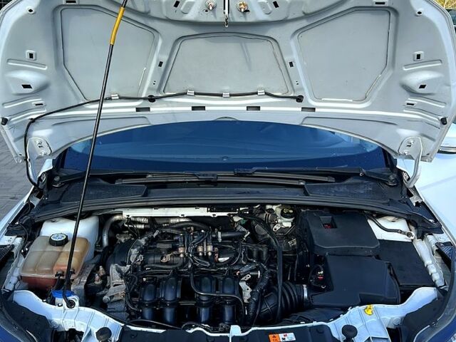 Белый Форд Фокус, объемом двигателя 1.6 л и пробегом 180 тыс. км за 6600 $, фото 6 на Automoto.ua