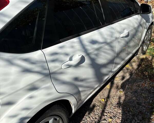 Білий Форд Фокус, об'ємом двигуна 1.6 л та пробігом 190 тис. км за 7300 $, фото 4 на Automoto.ua