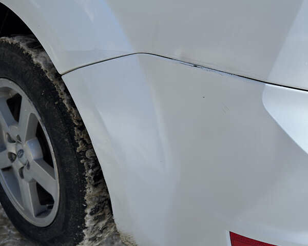 Білий Форд Фокус, об'ємом двигуна 1.4 л та пробігом 230 тис. км за 4050 $, фото 23 на Automoto.ua