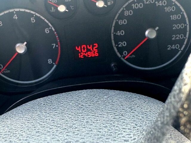 Білий Форд Фокус, об'ємом двигуна 1.4 л та пробігом 125 тис. км за 6000 $, фото 9 на Automoto.ua