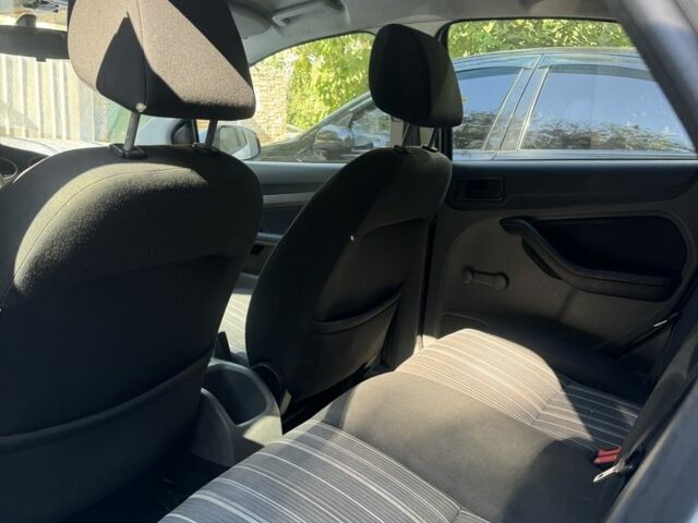 Білий Форд Фокус, об'ємом двигуна 1.4 л та пробігом 215 тис. км за 4500 $, фото 10 на Automoto.ua