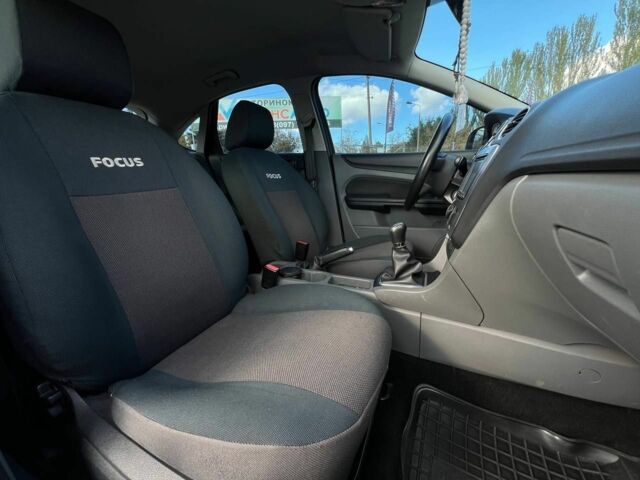 Білий Форд Фокус, об'ємом двигуна 1.4 л та пробігом 204 тис. км за 5100 $, фото 16 на Automoto.ua