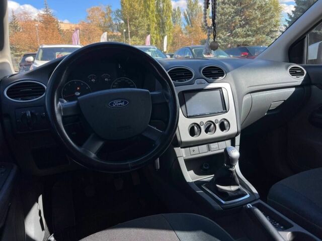 Білий Форд Фокус, об'ємом двигуна 1.4 л та пробігом 204 тис. км за 5100 $, фото 13 на Automoto.ua