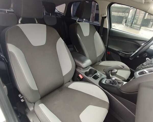 Білий Форд Фокус, об'ємом двигуна 1.6 л та пробігом 266 тис. км за 6999 $, фото 57 на Automoto.ua