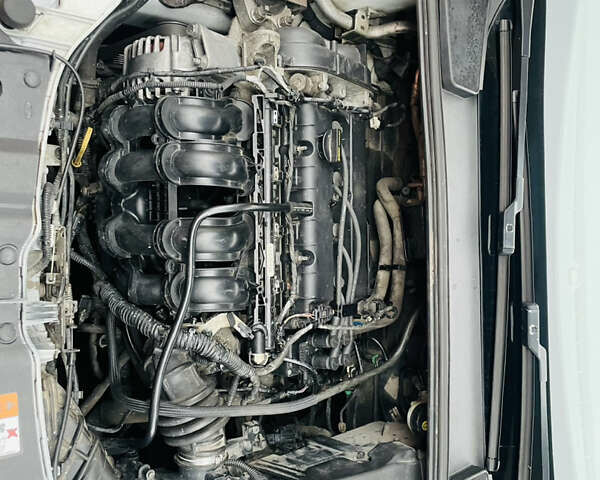 Белый Форд Фокус, объемом двигателя 1.6 л и пробегом 288 тыс. км за 5200 $, фото 11 на Automoto.ua