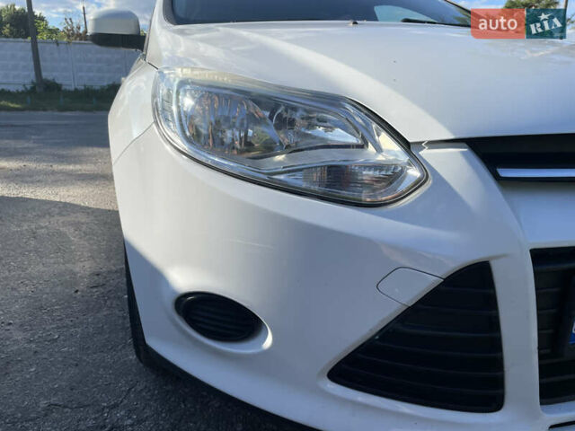 Белый Форд Фокус, объемом двигателя 1.6 л и пробегом 135 тыс. км за 7900 $, фото 6 на Automoto.ua