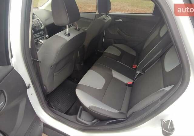 Білий Форд Фокус, об'ємом двигуна 1.6 л та пробігом 223 тис. км за 6900 $, фото 9 на Automoto.ua