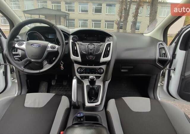 Білий Форд Фокус, об'ємом двигуна 1.6 л та пробігом 223 тис. км за 6900 $, фото 13 на Automoto.ua