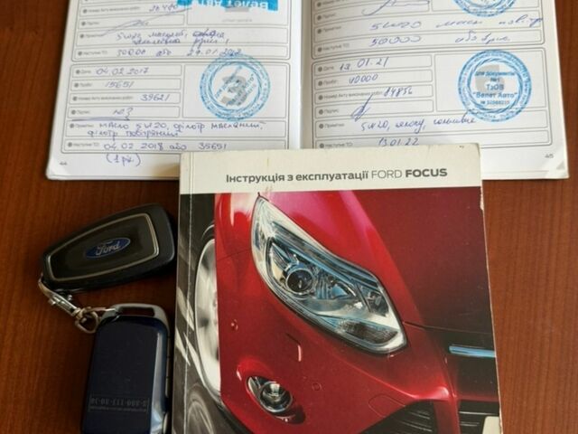Белый Форд Фокус, объемом двигателя 1 л и пробегом 65 тыс. км за 7000 $, фото 11 на Automoto.ua