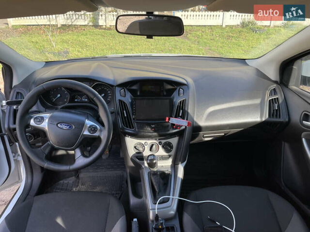 Білий Форд Фокус, об'ємом двигуна 1 л та пробігом 113 тис. км за 5500 $, фото 6 на Automoto.ua