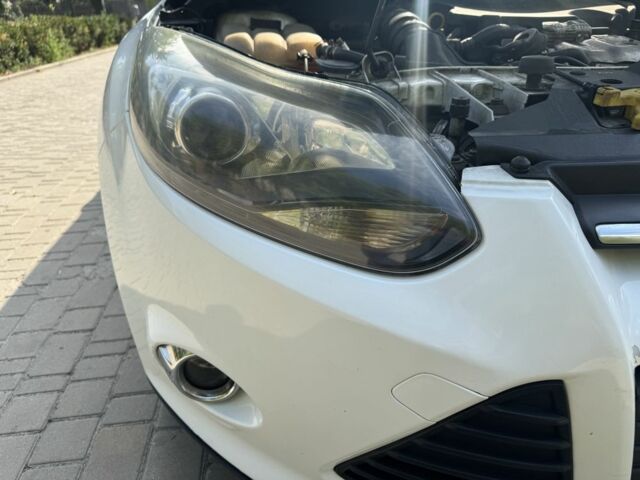 Белый Форд Фокус, объемом двигателя 1 л и пробегом 228 тыс. км за 6000 $, фото 11 на Automoto.ua