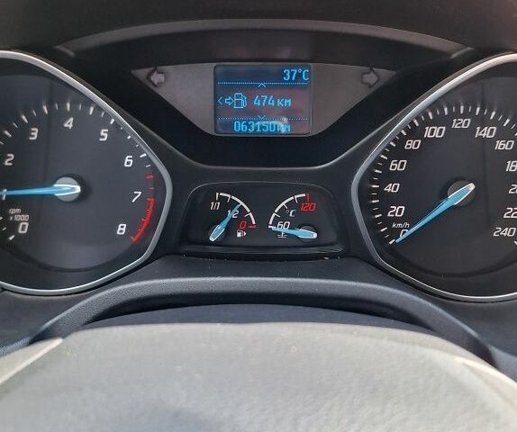 Білий Форд Фокус, об'ємом двигуна 1 л та пробігом 63 тис. км за 6620 $, фото 4 на Automoto.ua