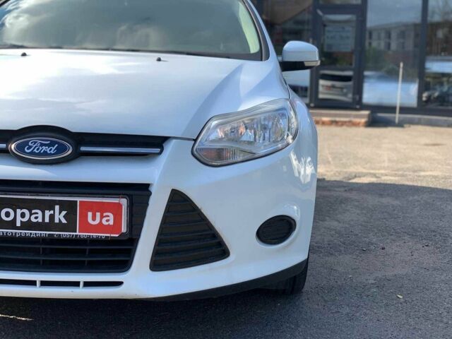 Білий Форд Фокус, об'ємом двигуна 1 л та пробігом 112 тис. км за 6984 $, фото 8 на Automoto.ua