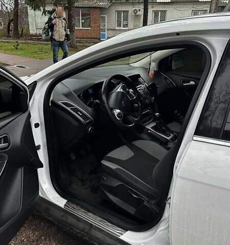 Белый Форд Фокус, объемом двигателя 1 л и пробегом 149 тыс. км за 6600 $, фото 5 на Automoto.ua