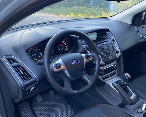 Белый Форд Фокус, объемом двигателя 1 л и пробегом 170 тыс. км за 6800 $, фото 8 на Automoto.ua