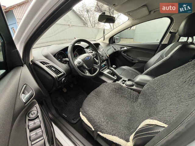 Білий Форд Фокус, об'ємом двигуна 1 л та пробігом 160 тис. км за 5990 $, фото 15 на Automoto.ua