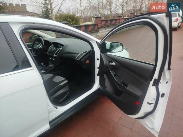 Білий Форд Фокус, об'ємом двигуна 1 л та пробігом 290 тис. км за 5000 $, фото 14 на Automoto.ua