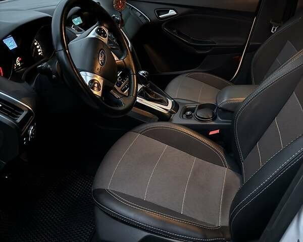 Белый Форд Фокус, объемом двигателя 1 л и пробегом 129 тыс. км за 7200 $, фото 7 на Automoto.ua