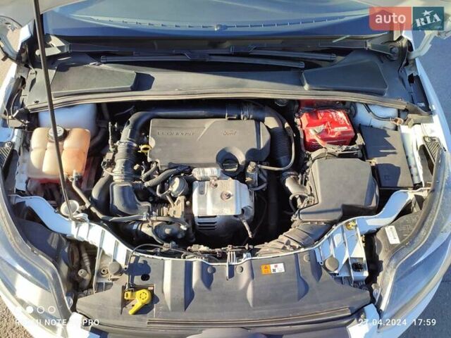 Белый Форд Фокус, объемом двигателя 1 л и пробегом 166 тыс. км за 6300 $, фото 16 на Automoto.ua