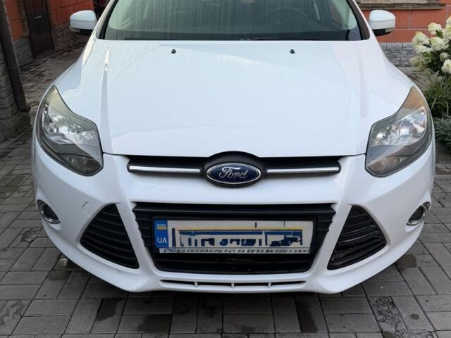 Білий Форд Фокус, об'ємом двигуна 1 л та пробігом 125 тис. км за 5300 $, фото 4 на Automoto.ua