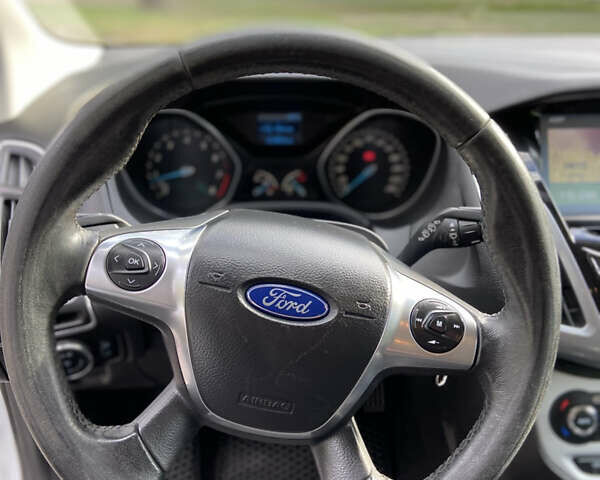 Білий Форд Фокус, об'ємом двигуна 1 л та пробігом 244 тис. км за 5650 $, фото 12 на Automoto.ua