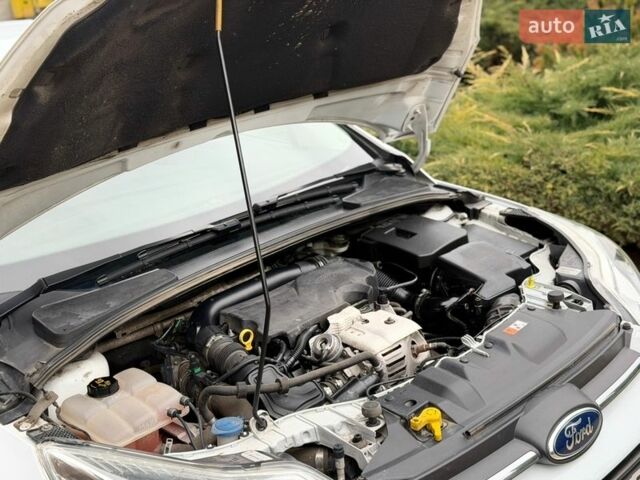 Білий Форд Фокус, об'ємом двигуна 1 л та пробігом 173 тис. км за 6333 $, фото 10 на Automoto.ua