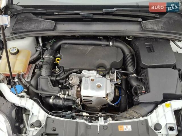 Белый Форд Фокус, объемом двигателя 1 л и пробегом 190 тыс. км за 5850 $, фото 12 на Automoto.ua