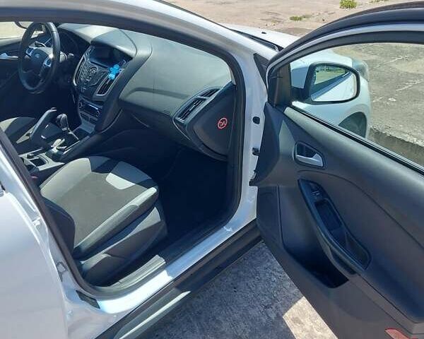 Белый Форд Фокус, объемом двигателя 1 л и пробегом 85 тыс. км за 6300 $, фото 10 на Automoto.ua