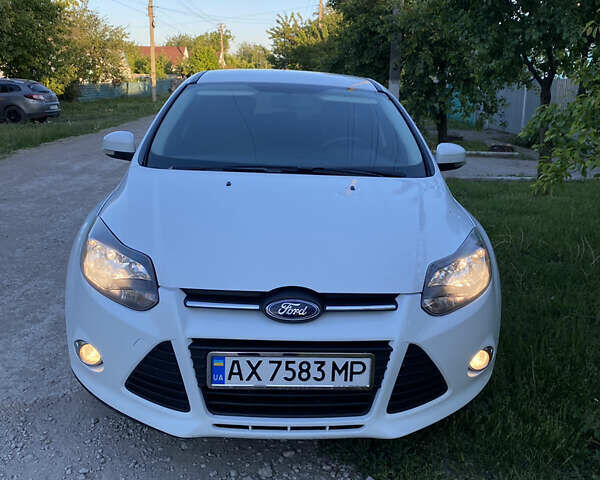 Белый Форд Фокус, объемом двигателя 1 л и пробегом 170 тыс. км за 6800 $, фото 1 на Automoto.ua